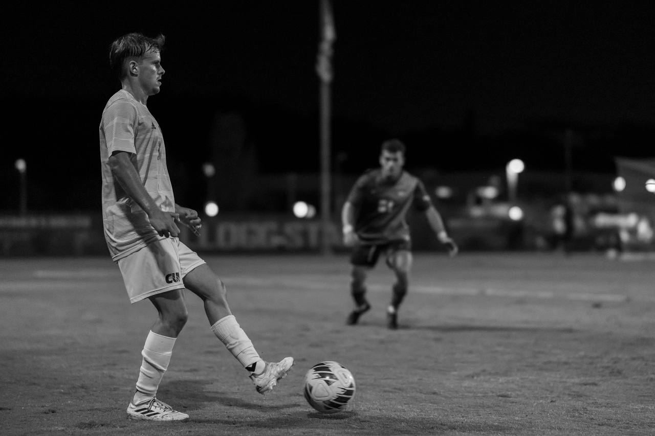 Julian Svoboda playing college soccer at CUI